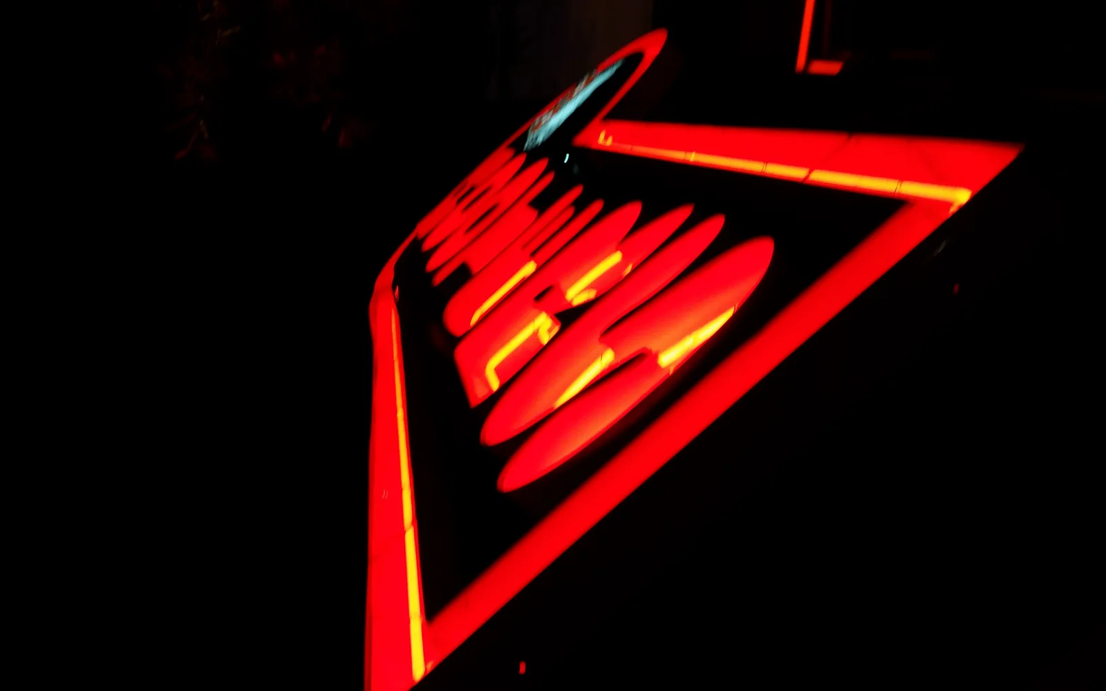 Neon lights at night creating a colorful urban display